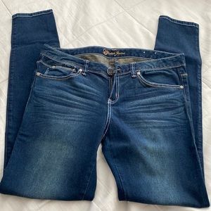 NWOT Guess blue Jeans size 30. Skinny low rise 5 pockets. Never worn.